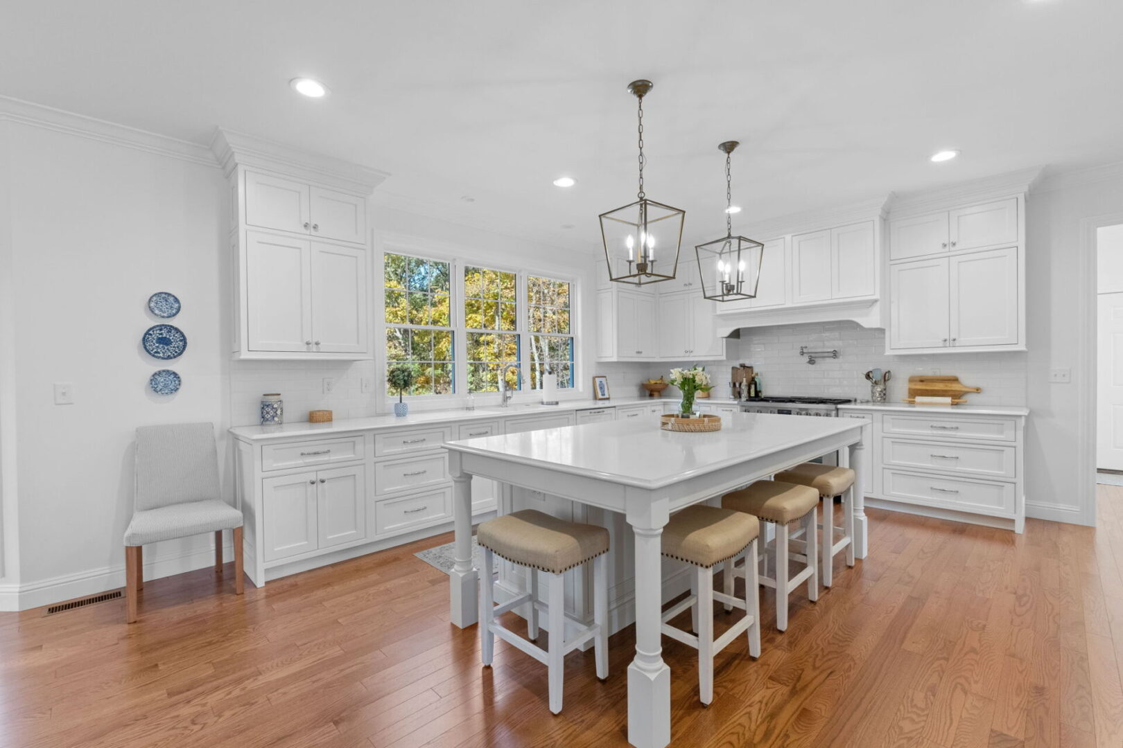 Exquisite kitchen with custom Shiloh cabinets paired with a spacious island and Cambria countertops.
