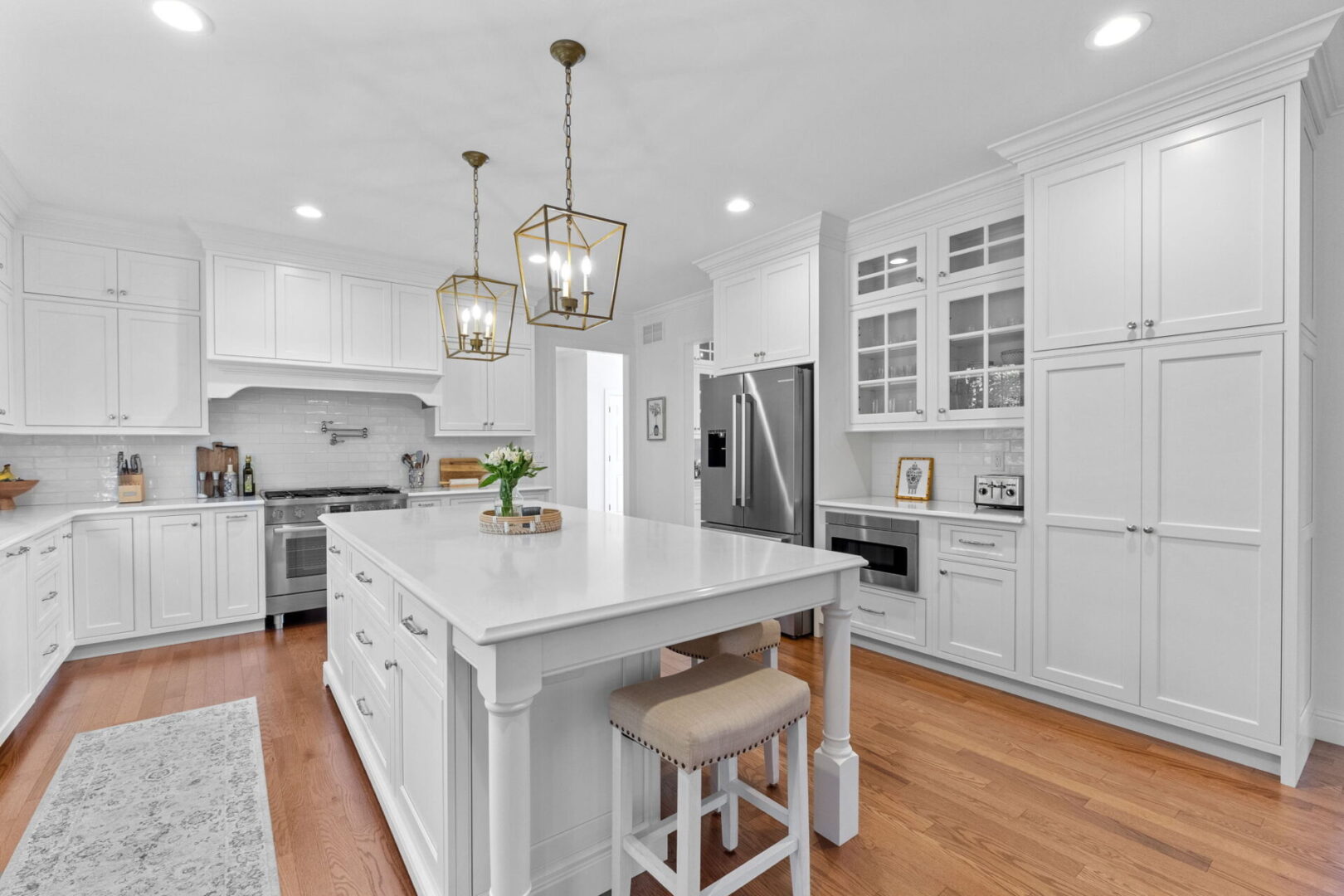 Exquisite kitchen with custom Shiloh cabinets paired with a spacious island and Cambria countertops.