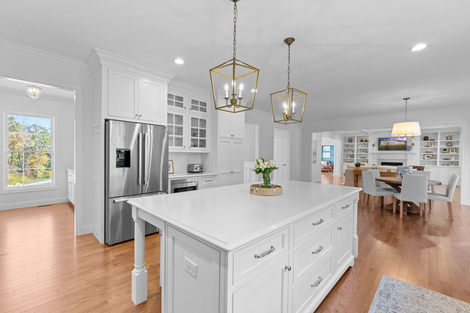 Exquisite kitchen with custom Shiloh cabinets paired with a spacious island and Cambria countertops.