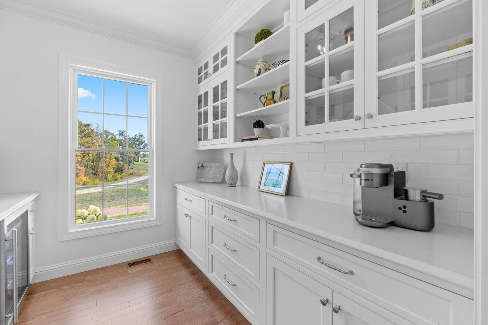 Butler's pantry and bourbon room featuring custom Shiloh cabinetry.