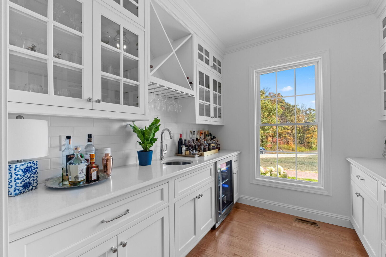 Butler's pantry and bourbon room featuring custom Shiloh cabinetry.