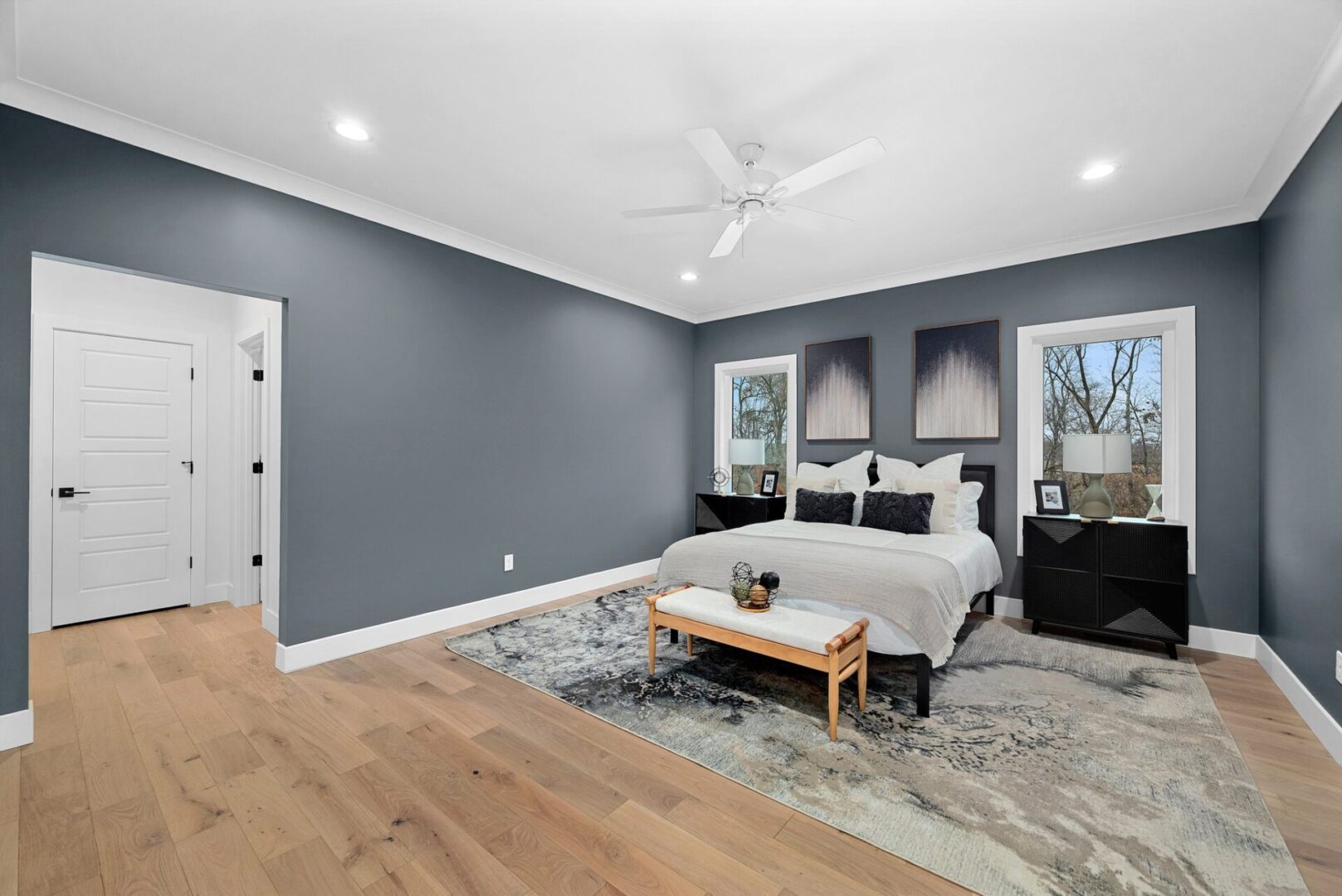 The primary bedroom suite features an entry walk-in closet and an en-suite bathroom.