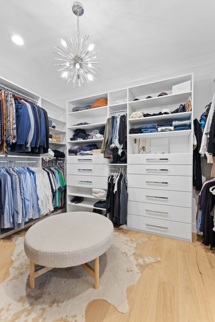 Primary closet by St. Louis Closet CO.
