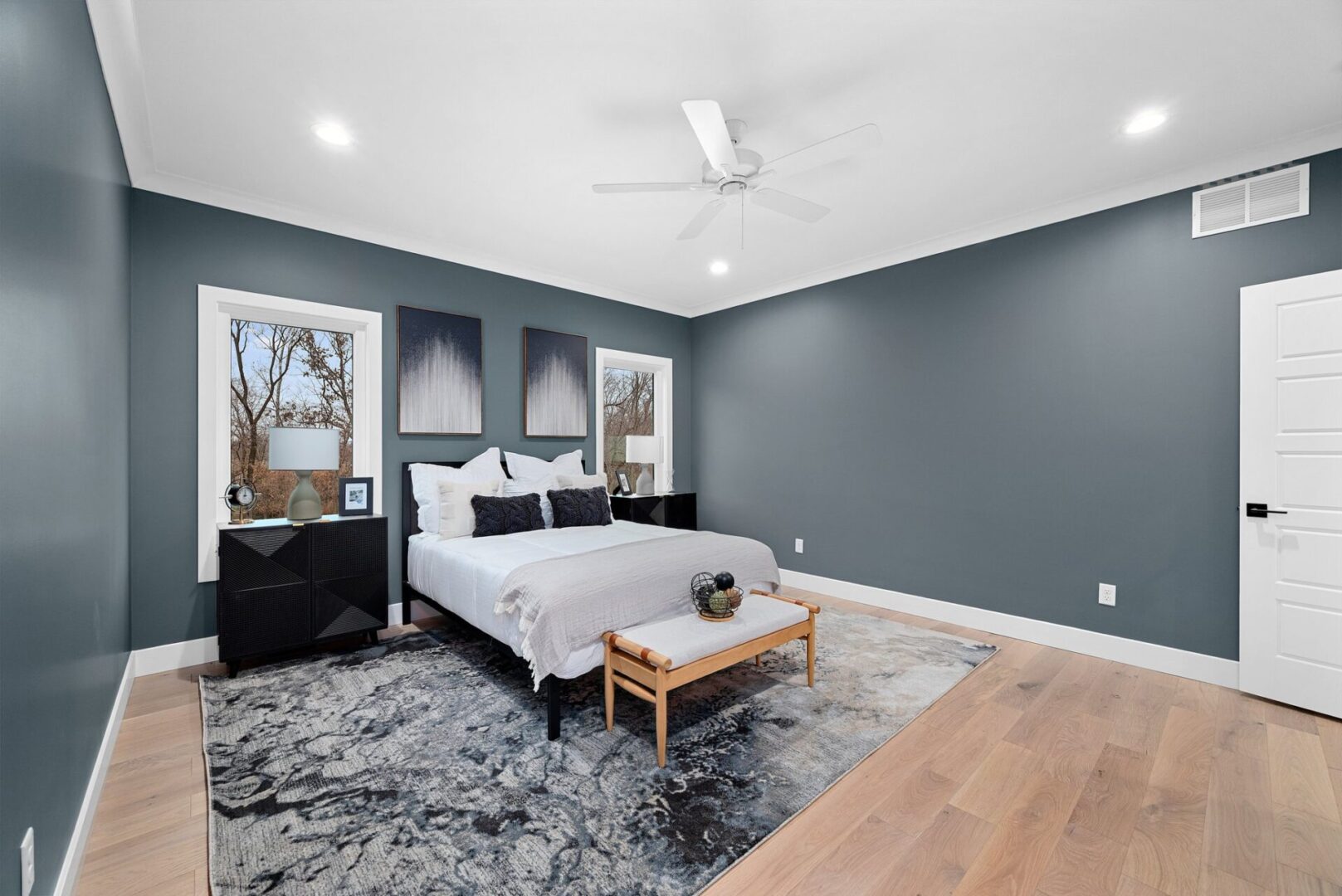 The primary bedroom suite features an entry walk-in closet and an en-suite bathroom.