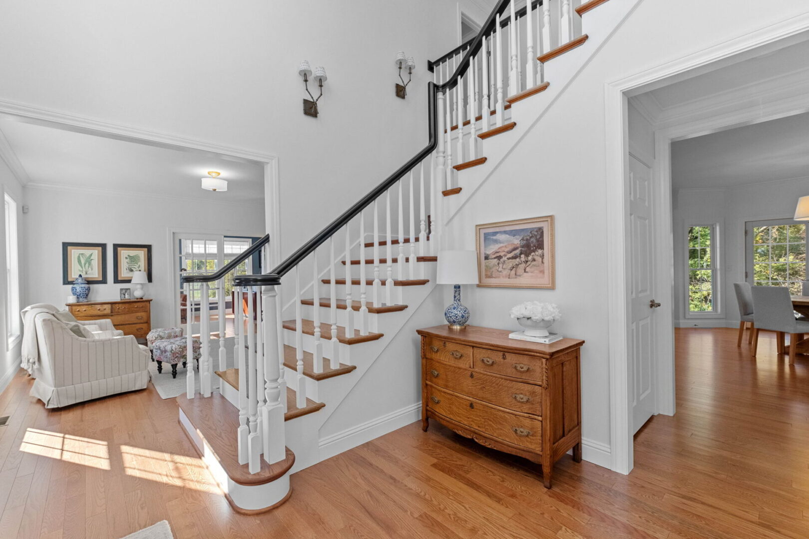 Entry way with custom wood staircase