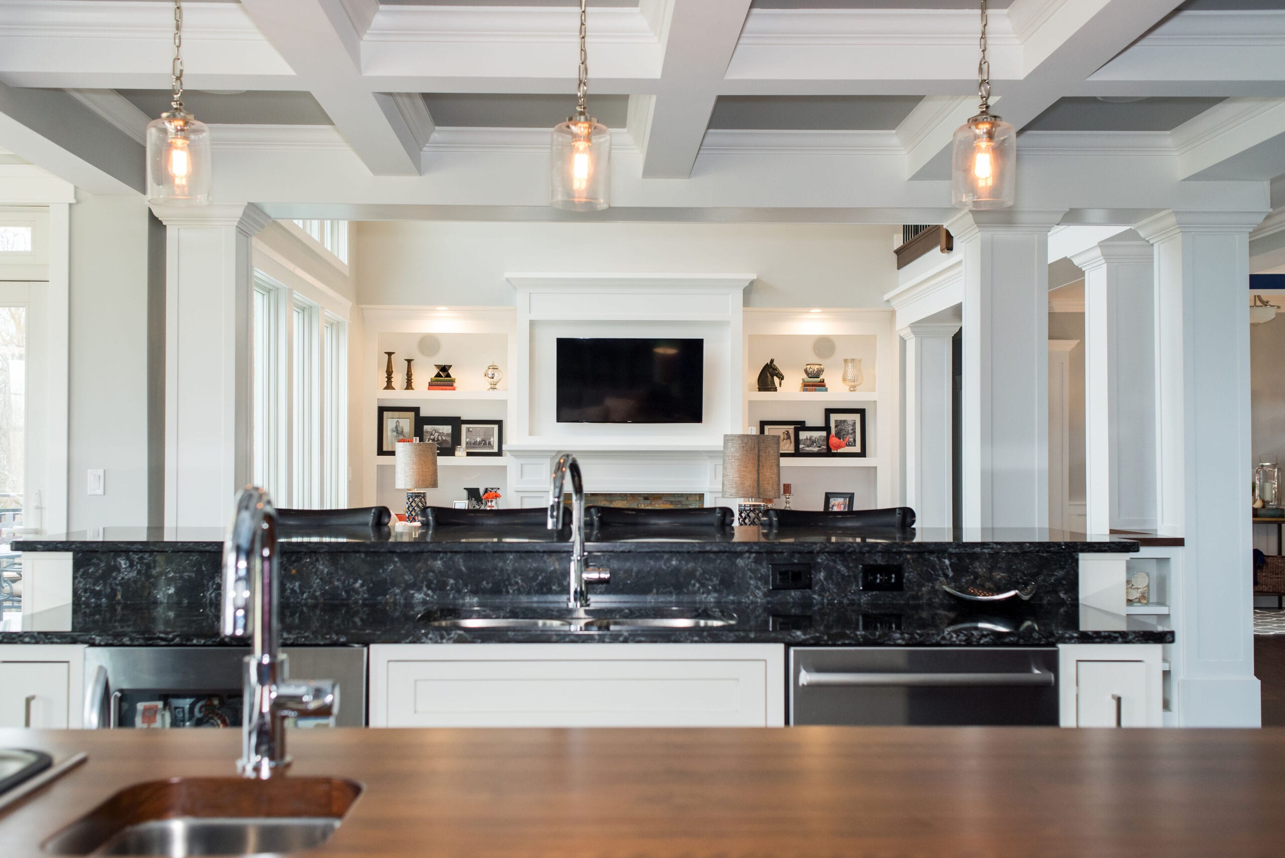 A Craftsman-style great room with coffered ceiling.