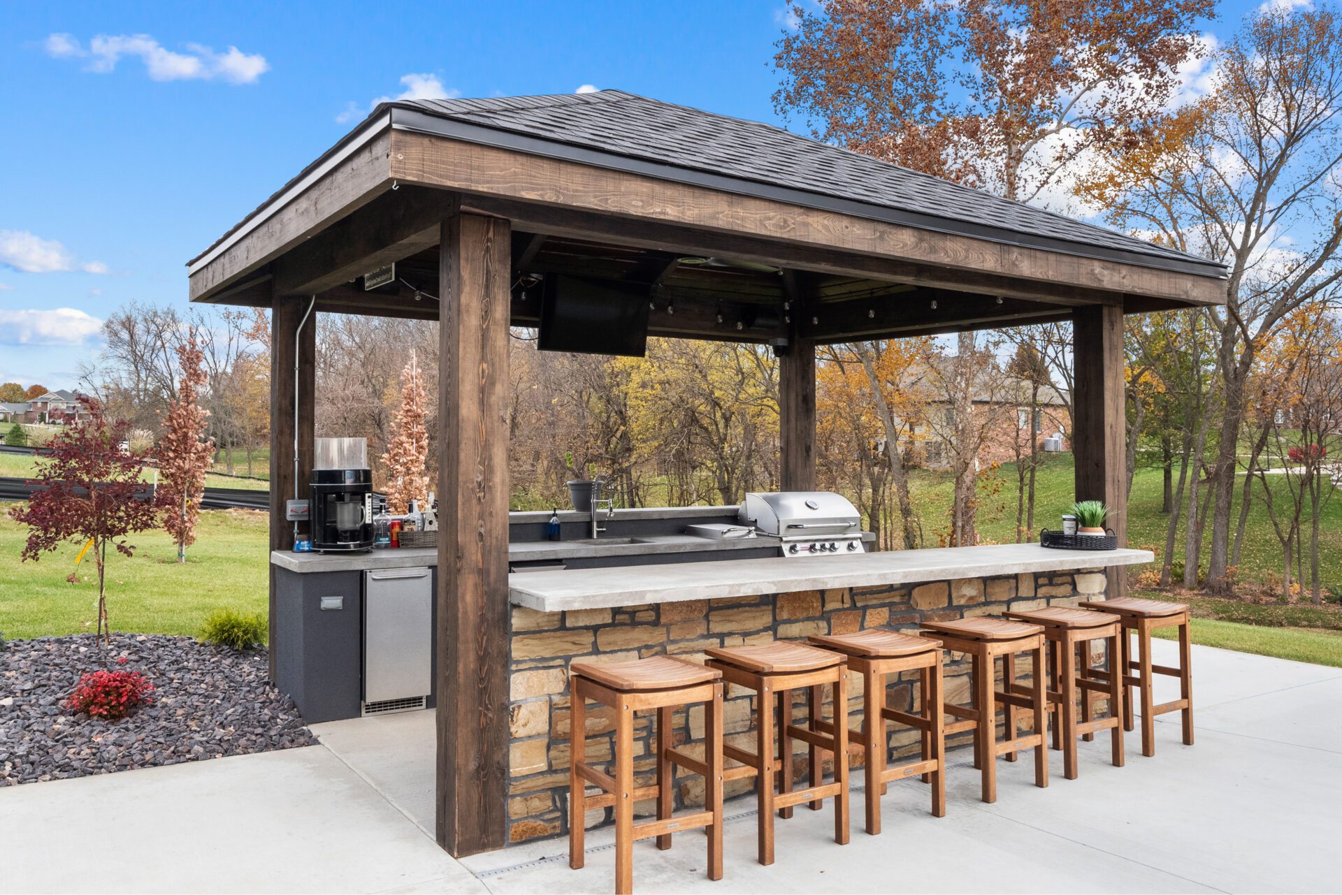 Covered outside kitchen and pool bar.
