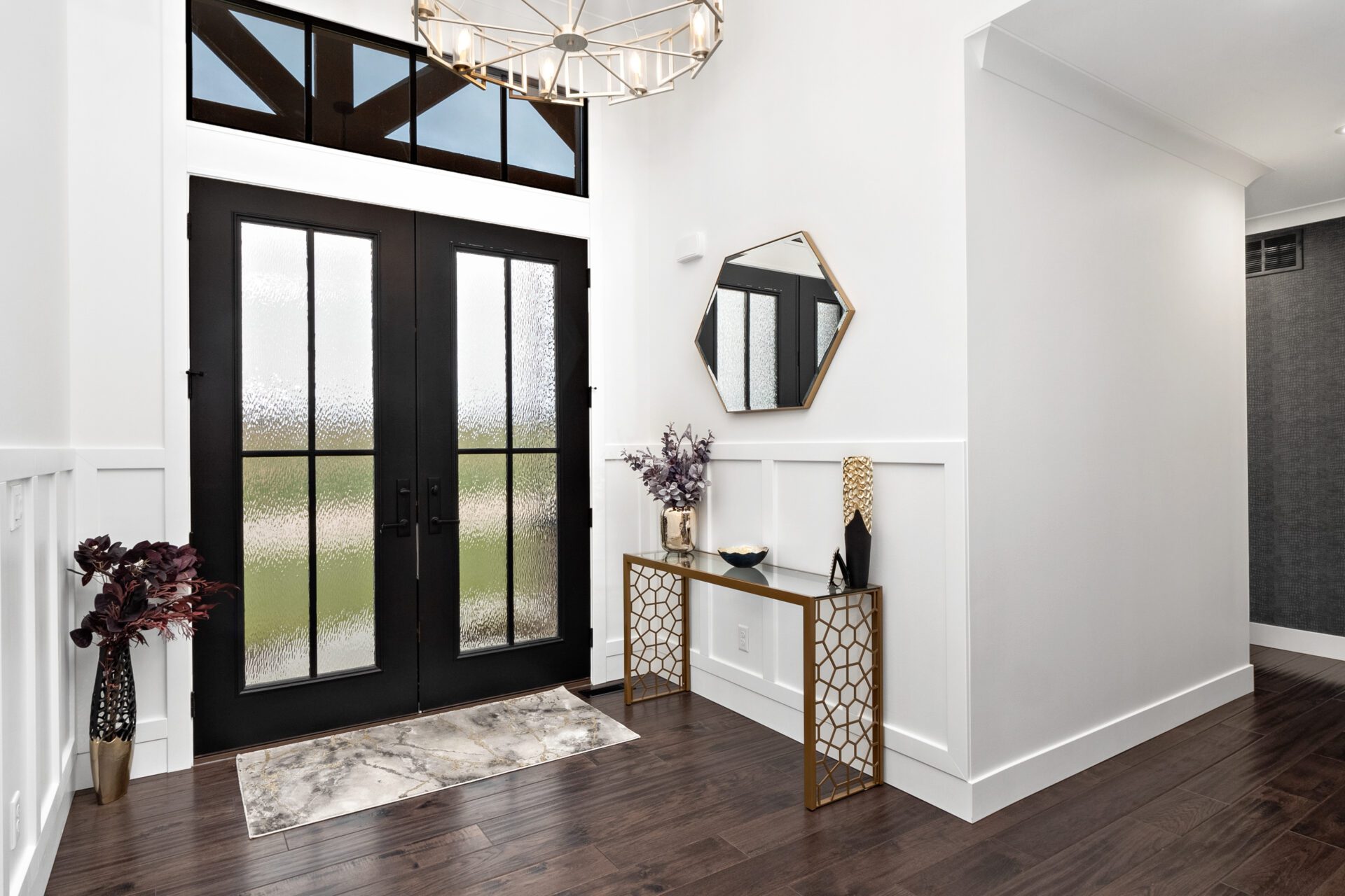 A modern entryway adorned with wainscoting.