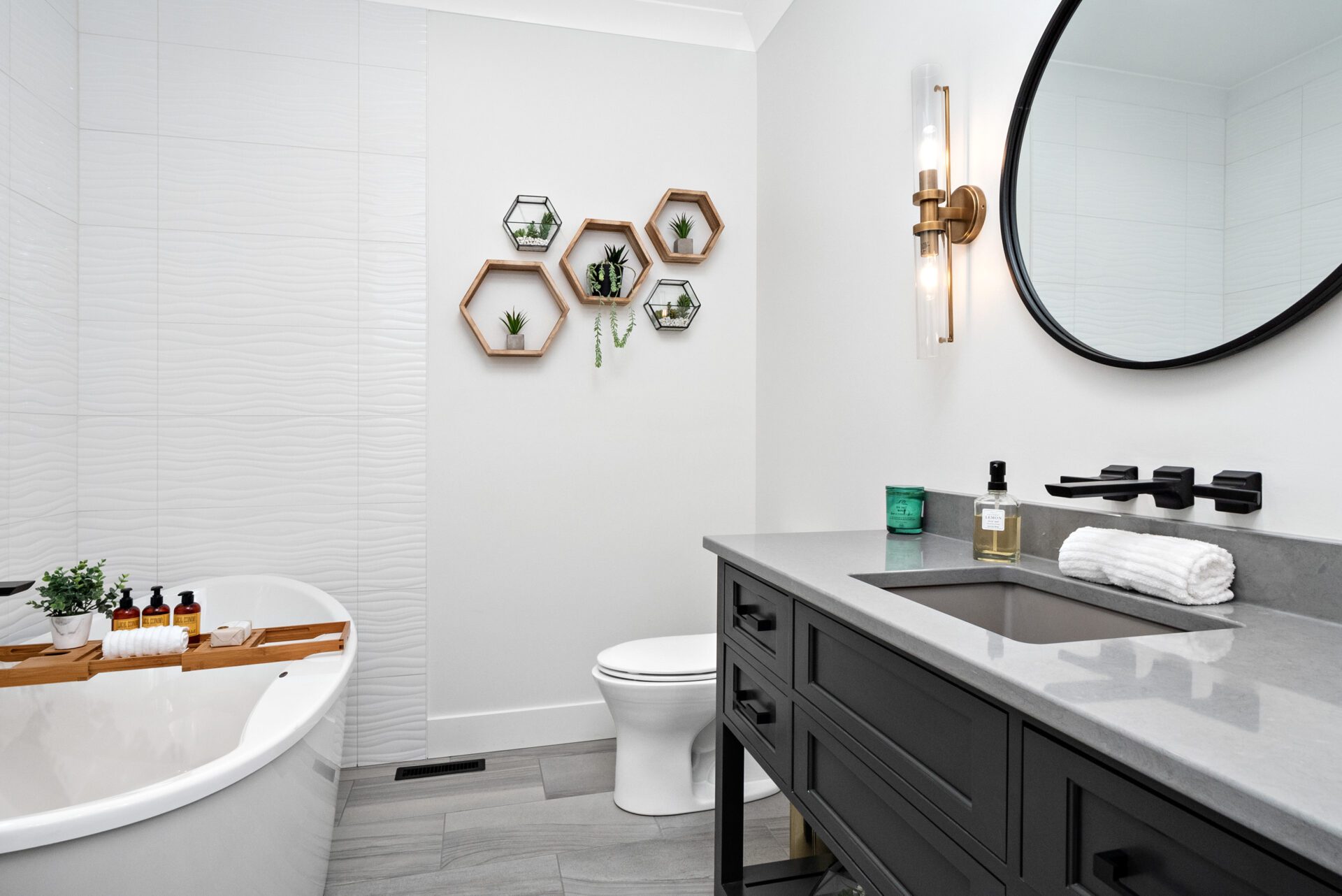 A shared full bathroom featuring spa decor and ambiance.